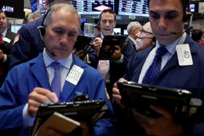 Futures slightly lower as oil prices slip